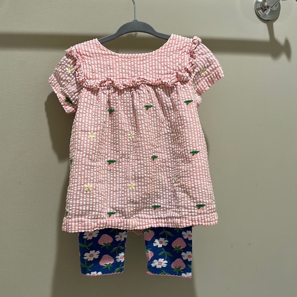Baby Boden seal sucker strawberry and daisy top with matching leggings.